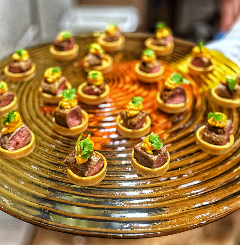 Lamb fillet and red pepper humus canape